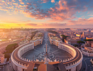 An aerial view of St. Peter's Square and Basilica in Rome, Italy, during a beautiful sunset. An aerial view of St. Peter's Square and Basilica in Rome, Italy, during a beautiful sunset.