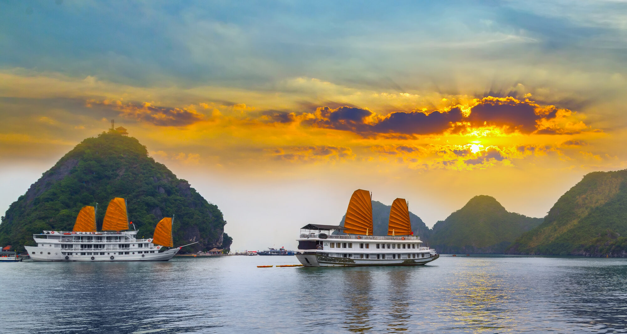 Tourist junks floating Ha Long Bay, South China Sea Vietnam