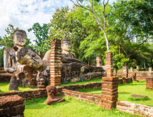 Big three antique sitting and sleeping buddha in world heritage Kamphaeng Phet historical park, Thailand. Wat phra kaew temple.