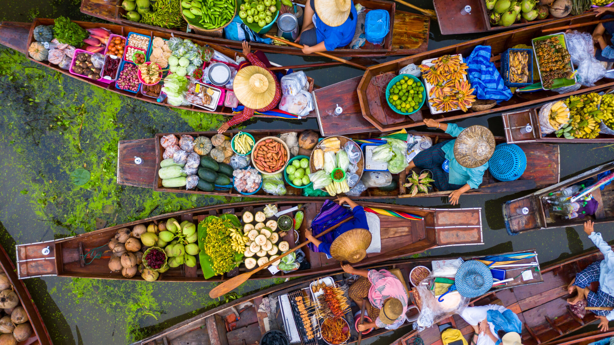 Aerial view famous floating market in Thailand, Damnoen Saduak f Aerial view famous floating market in Thailand, Damnoen Saduak f
