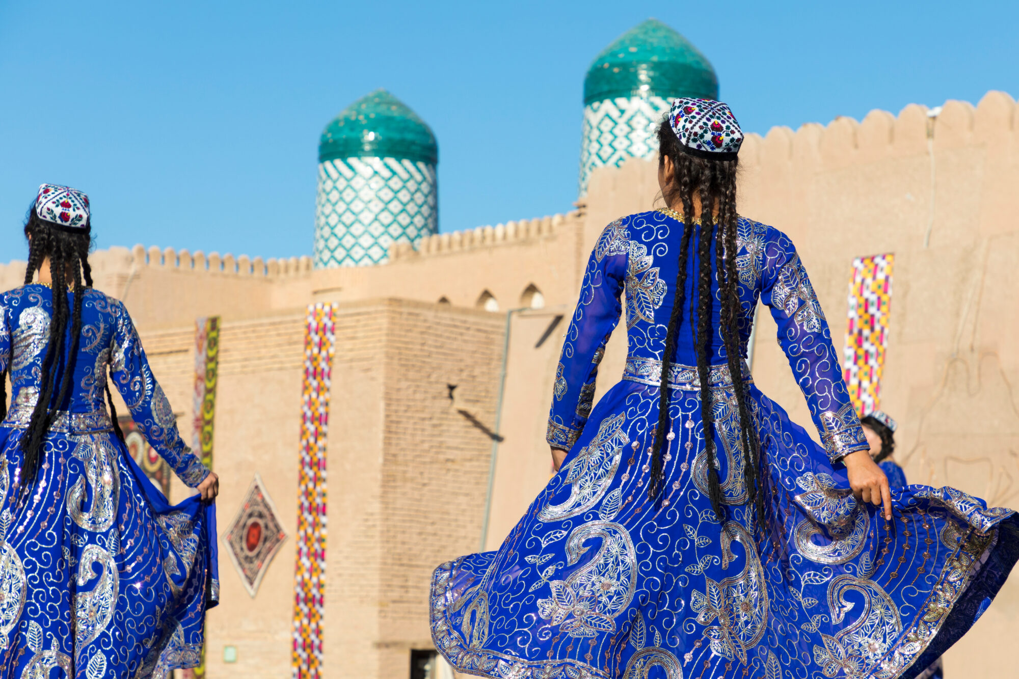 Folk dancers performs traditional dance at local festivals in Khiva, Uzbeksitan. Folk dancers performs traditional dance at local festivals in Khiva, Uzbeksitan.