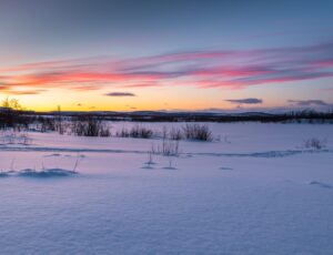 Snowy,Landscape,In,Winter,Day.,Beautiful,Sunrise.,Mountains,Of,Abisko viaggi culturali tour in lapponia